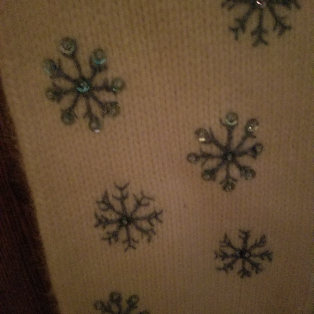 Knit scarf with blue sparkle snowflakes